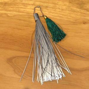 Reflective and green tassel charm